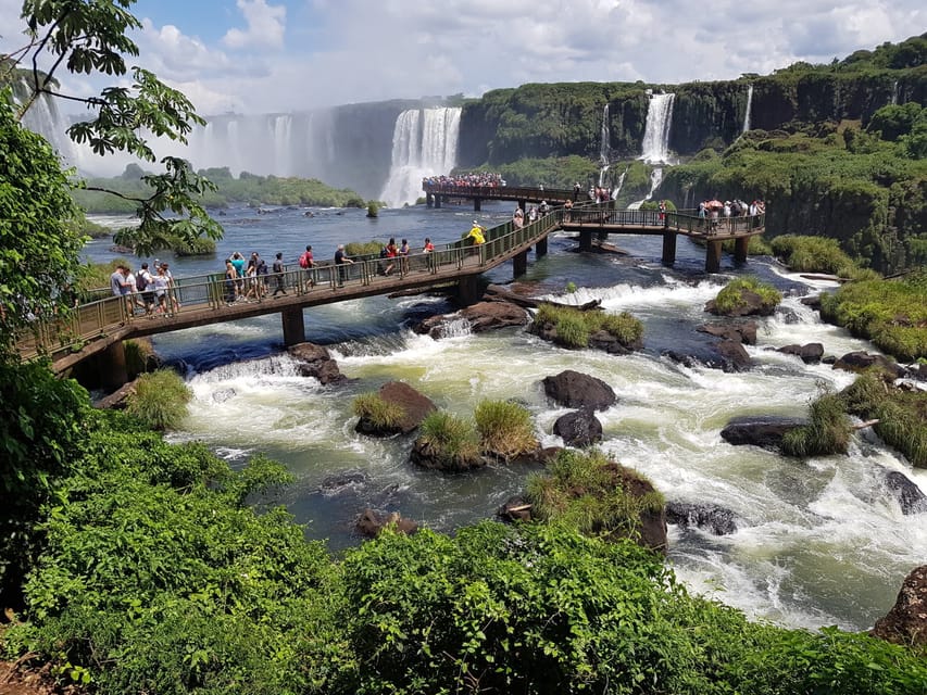 From Foz do Iguaçu: Brazilian Falls and Bird Park Tour - The Brazilian Falls walk and the view toward Argentina