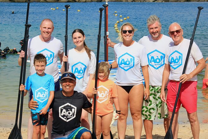 Stand Up Paddle Boarding Lesson in Playa Flamingo - From knees to standing on the board